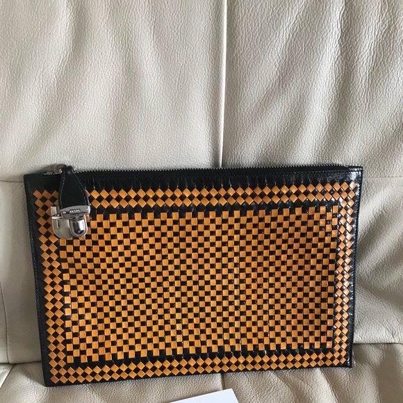 prada woven clutch